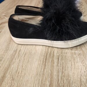 Steve Madden Emily black suede slip-on sneaker with a feather pom-pom